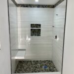 Natural feel bathroom with river rock floor